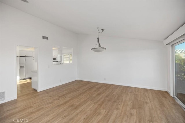 31232 Palma Dr, Laguna Niguel, CA 92677 - unfurnished dining area featuring light wood-type flooring and baseboards