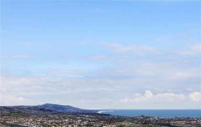 view of mountain feature featuring a water view