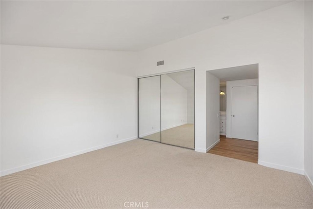 31232 Palma Dr, Laguna Niguel, CA 92677 - unfurnished bedroom featuring carpet, baseboards, and a closet