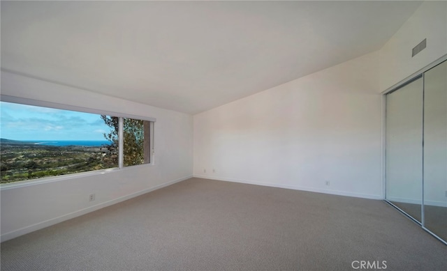 31232 Palma Dr, Laguna Niguel, CA 92677 - unfurnished bedroom featuring light colored carpet and a closet