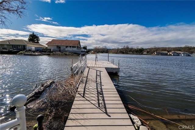 dock area featuring a water view