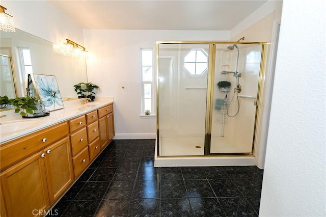 bathroom featuring vanity and walk in shower