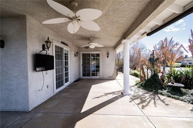 view of patio featuring ceiling fan