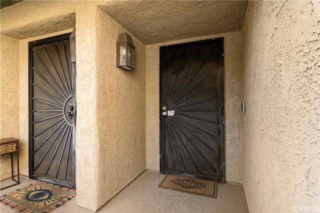 769 Birchpark Cir Unit 207, Thousand Oaks, CA 91360 - view of exterior entry featuring stucco siding