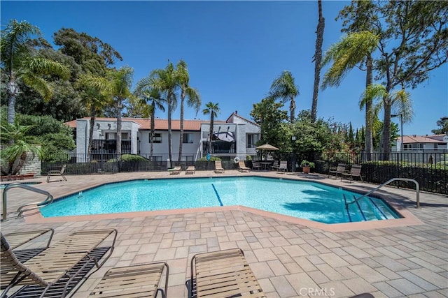 2323 Huntington St Unit 907, Huntington Beach, CA 92648 - community pool with a patio and fence