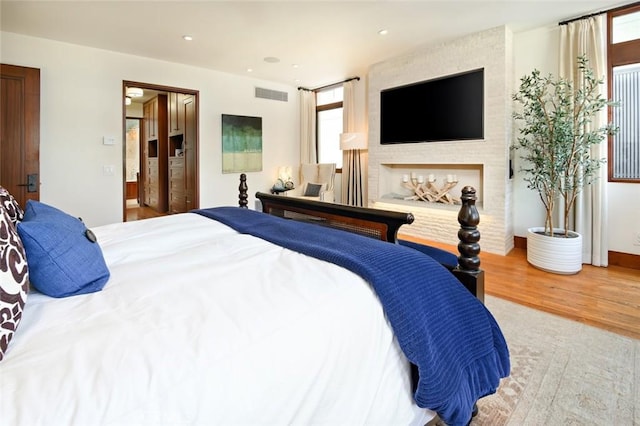 bedroom featuring wood-type flooring