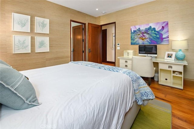 bedroom featuring hardwood / wood-style flooring