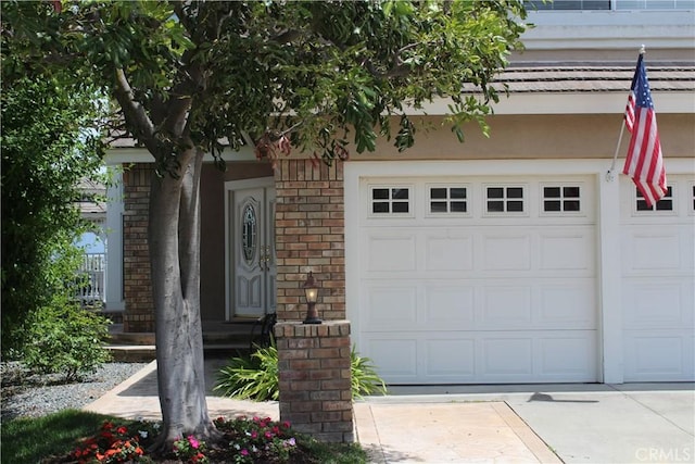 exterior space featuring concrete driveway