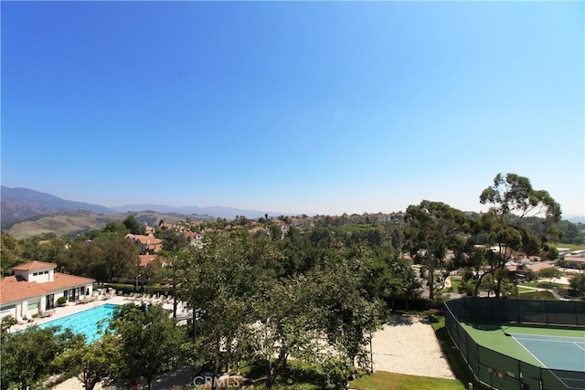 birds eye view of property with a mountain view