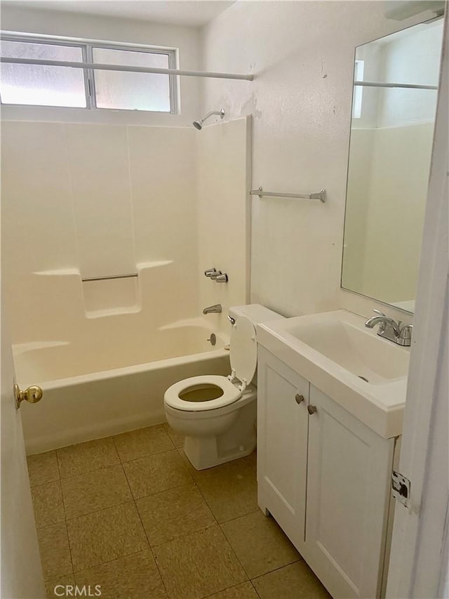 bathroom featuring shower / bath combination, tile patterned floors, toilet, and vanity