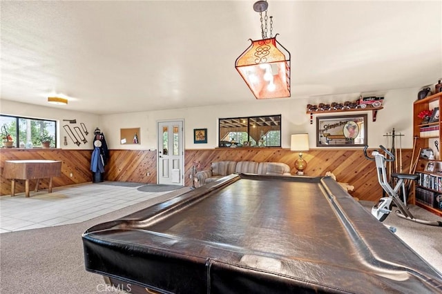 game room with pool table, carpet floors, and wood walls