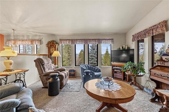 carpeted living room featuring a wealth of natural light