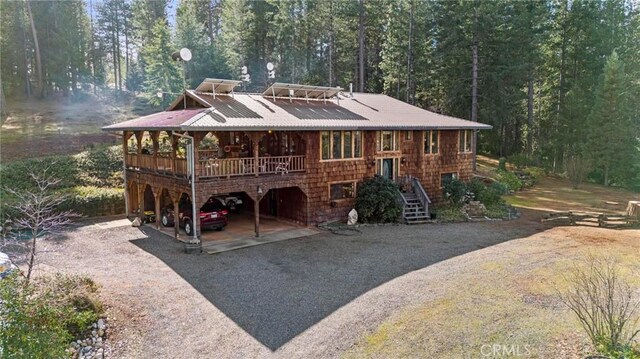 view of front facade with a carport