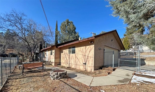 view of property exterior with a garage