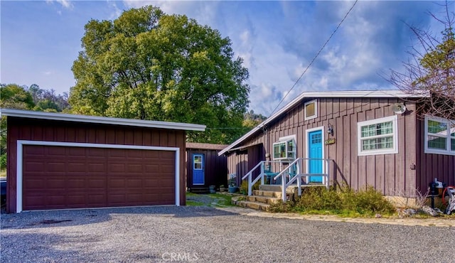 view of front of home with a garage and board and batten siding