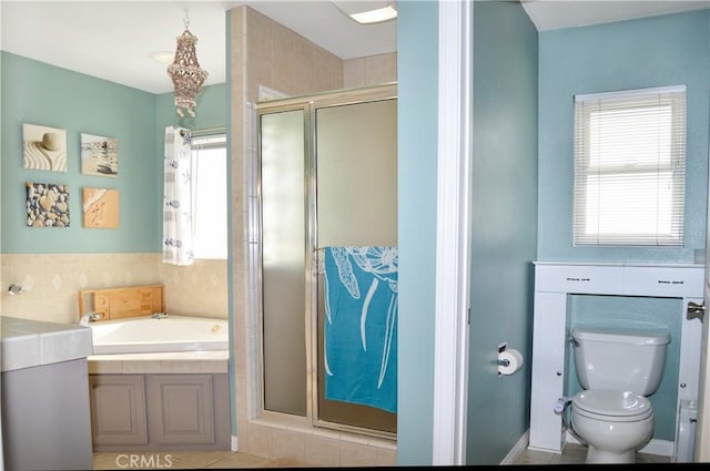 full bath featuring a shower stall, toilet, and a bath