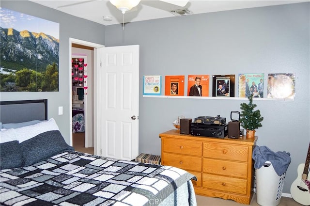 bedroom featuring ceiling fan and visible vents