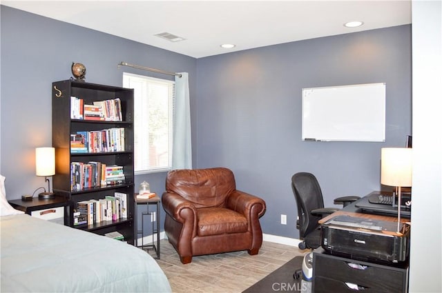 bedroom featuring recessed lighting, baseboards, visible vents, and wood finished floors