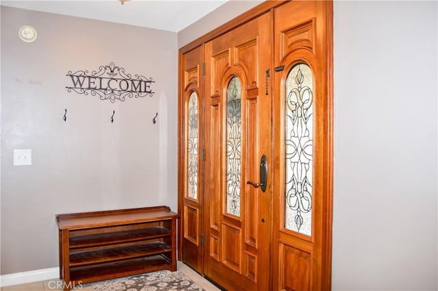 entrance foyer featuring baseboards
