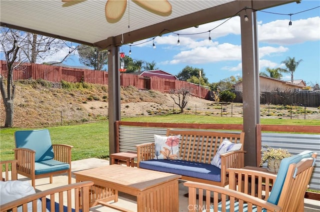 view of patio with a fenced backyard, an outdoor hangout area, and ceiling fan