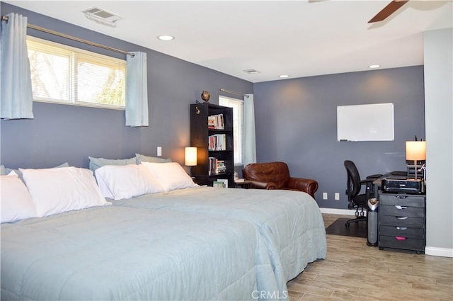 bedroom with visible vents, baseboards, ceiling fan, recessed lighting, and light wood-style flooring