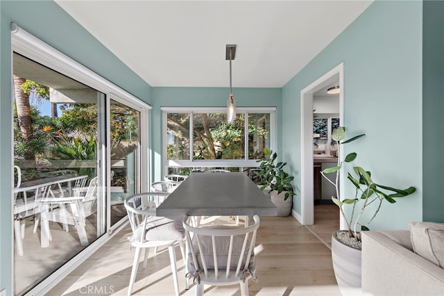 sunroom / solarium featuring plenty of natural light