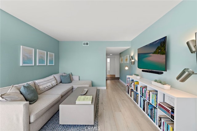 living room featuring light wood-type flooring