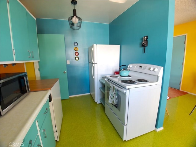 kitchen with hanging light fixtures and white appliances