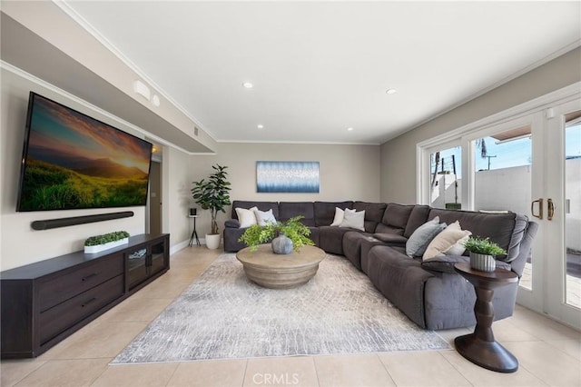 living room featuring recessed lighting, crown molding, baseboards, and light tile patterned floors