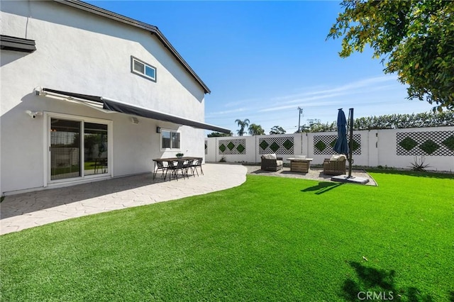 view of yard with a fenced backyard and a patio