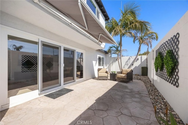 view of patio featuring a fenced backyard