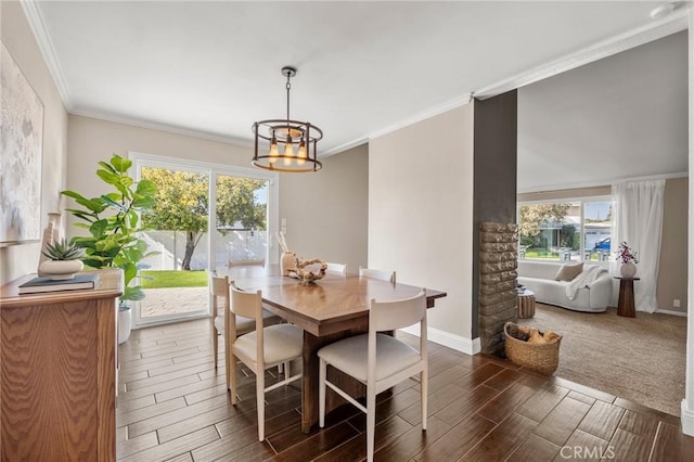 dining space with a notable chandelier, crown molding, baseboards, and wood tiled floor