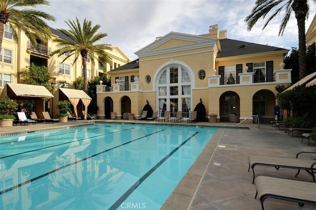 pool with a patio