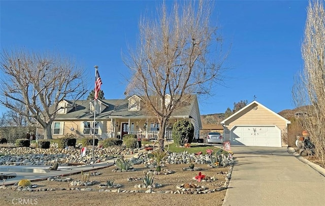 view of front of property with a garage and covered porch