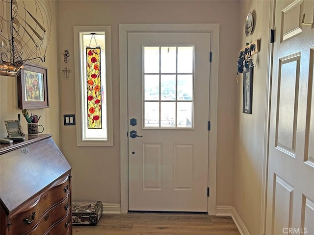 doorway featuring light hardwood / wood-style floors