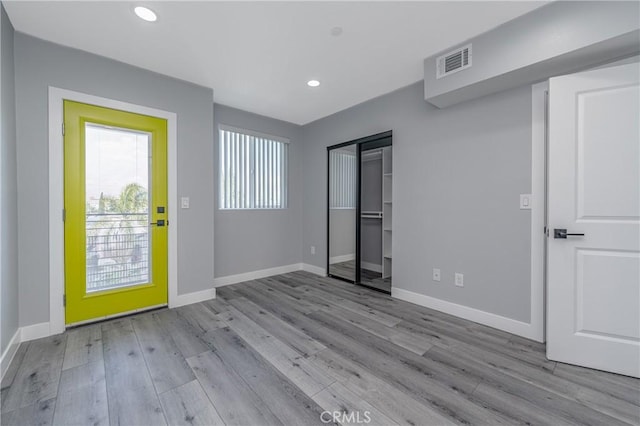 interior space with light hardwood / wood-style flooring