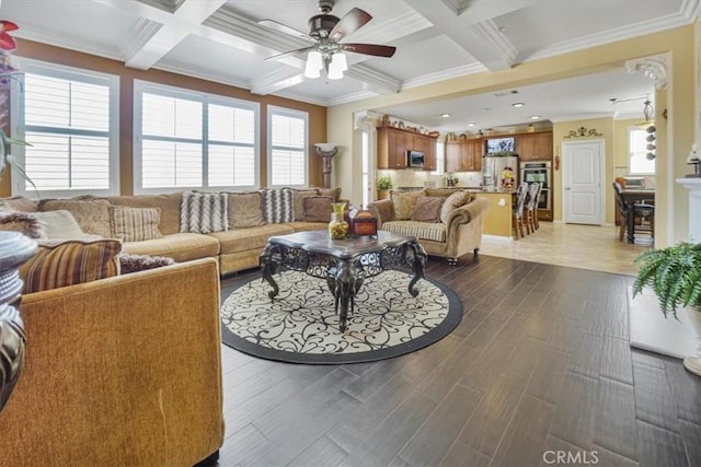 5003 Thornberry Way, Fontana, CA 92336 - living area featuring dark wood-type flooring, ceiling fan, ornamental molding, and coffered ceiling