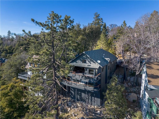 bird's eye view featuring a forest view