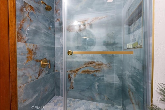 bathroom featuring a stall shower