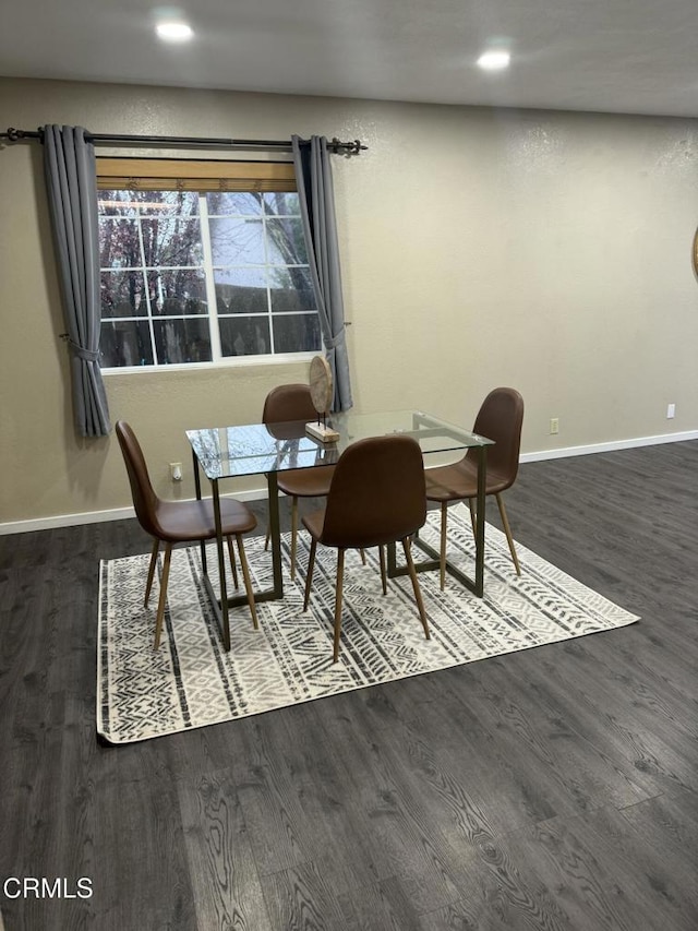 dining room featuring dark wood-type flooring