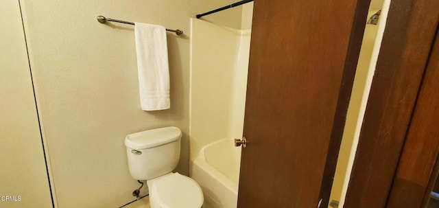 full bathroom featuring toilet, a bathtub, and walk in shower