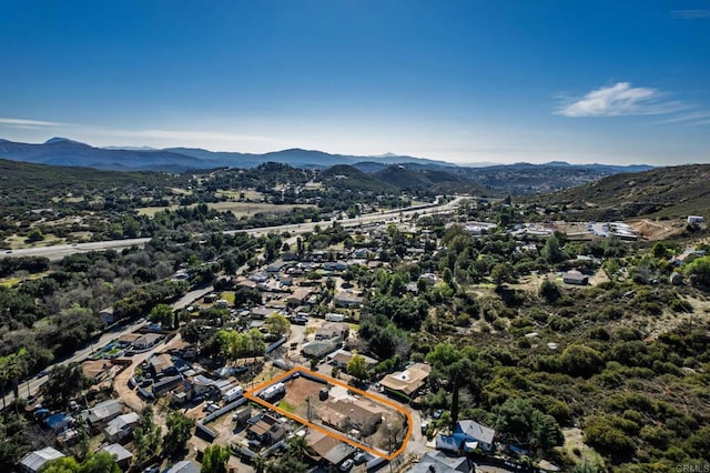 birds eye view of property featuring a residential view and a mountain view