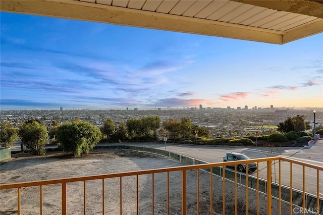 view of balcony at dusk