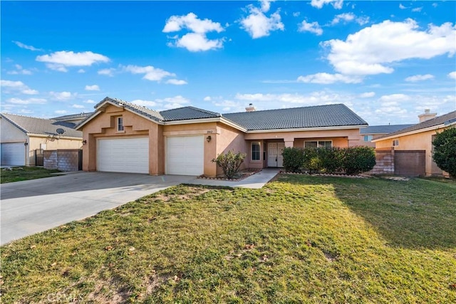 ranch-style home featuring a garage and a front lawn