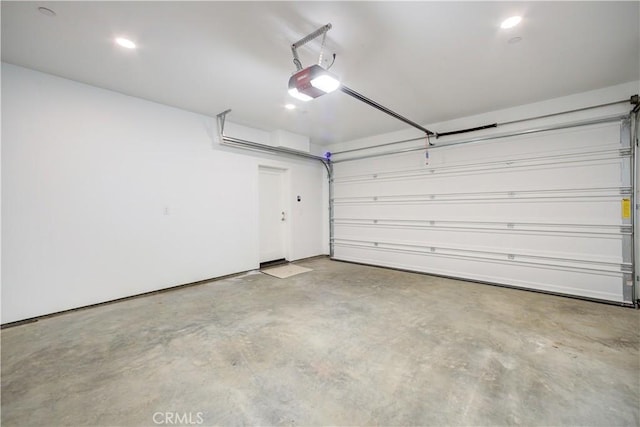 garage featuring a garage door opener