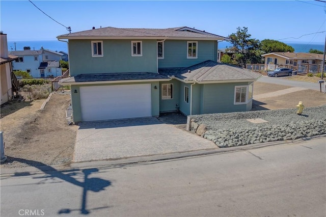 front of property with a garage