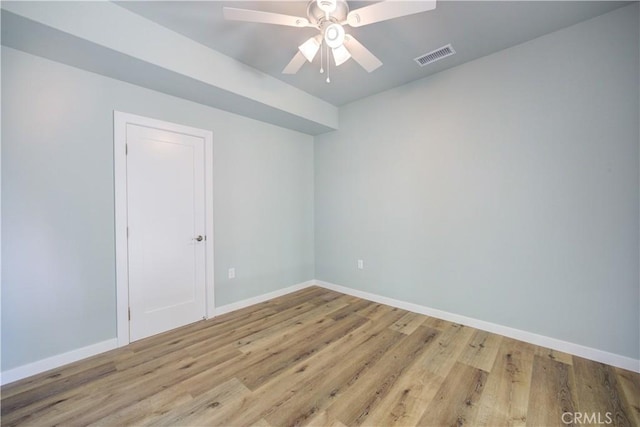 unfurnished room with ceiling fan and light wood-type flooring