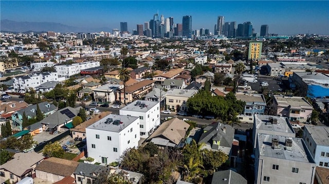 drone / aerial view featuring a city view