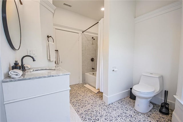 full bathroom featuring vanity, tile patterned floors, toilet, and shower / bath combo with shower curtain