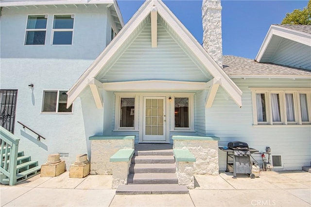 view of front of home featuring a patio area